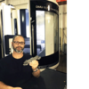 mike jezowski with complex 5-axis part | ramco machine – Vice President Mike Jezowski shows a complex 5-axis part